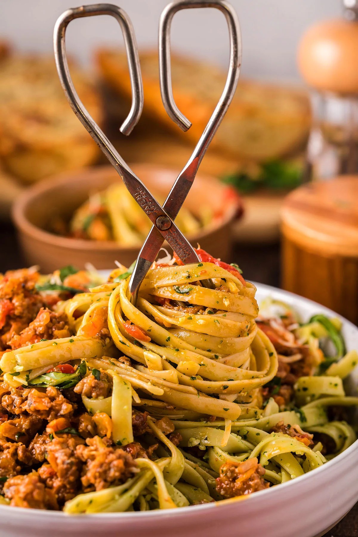 Pesto Fettuccini with Bolognese Sauce